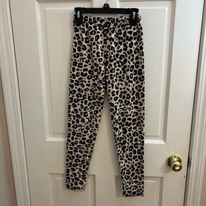 Girls New Mix leopard leggings. Size large.
